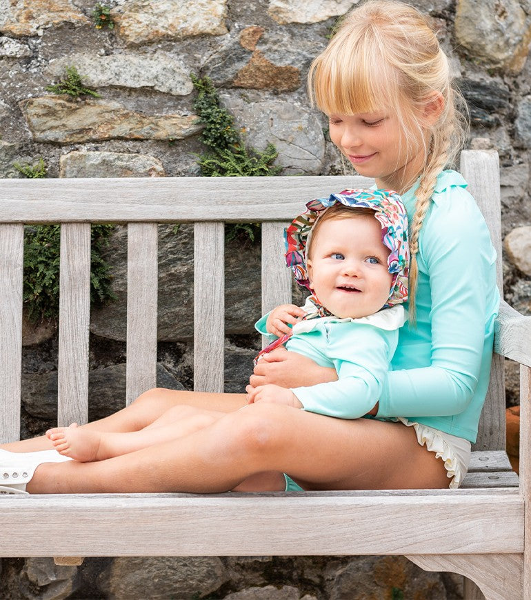 Chapeau anti-UV pour bébé et fille Fleur en Liberty Jungle de CANOPEA