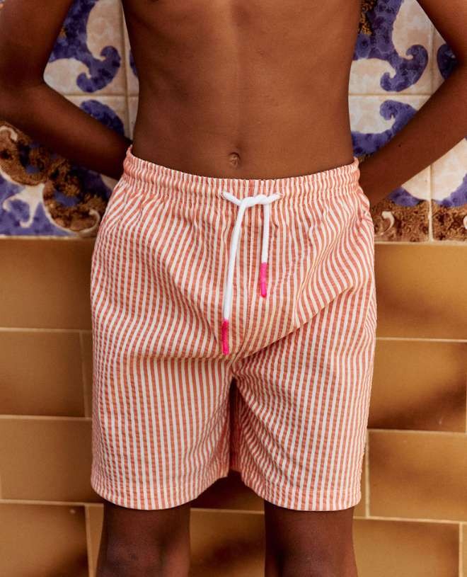 Tangerine orange seersucker swim shorts for boys by Canopea