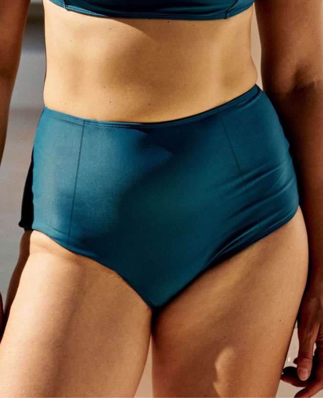 Sun protective bikini bottom for women LEANDRA in peacock color by Canopea
