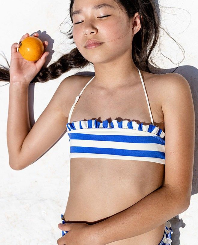 Stripe blue sun protective bikini top with ruffles for girl by Canopea