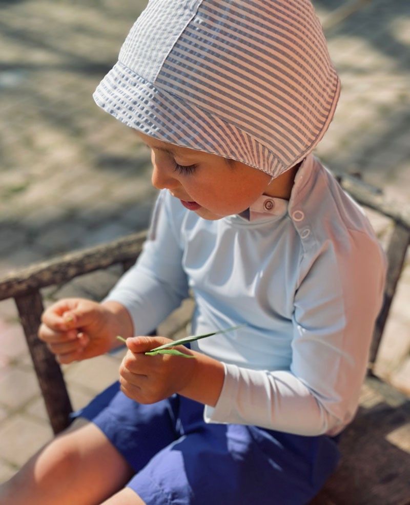 Sun protective hat for boy, girl, children, kid and baby in grenada red by Canopea