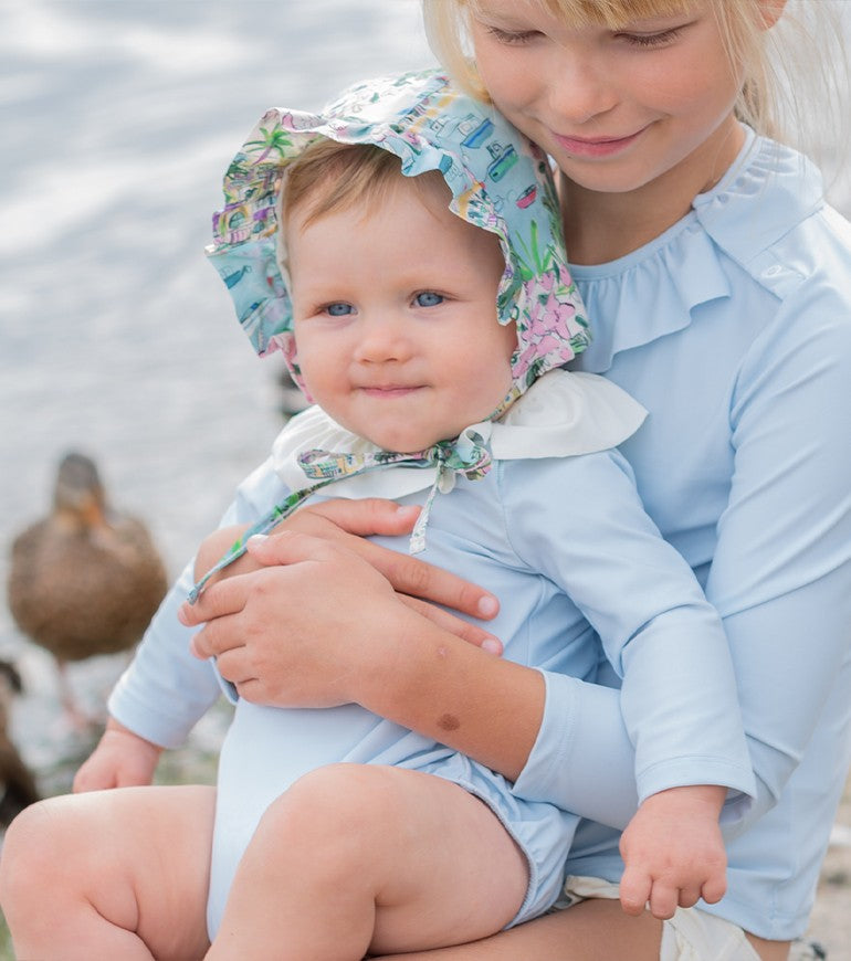 Sun protective hat for baby girl in Liberty vista by Canopea