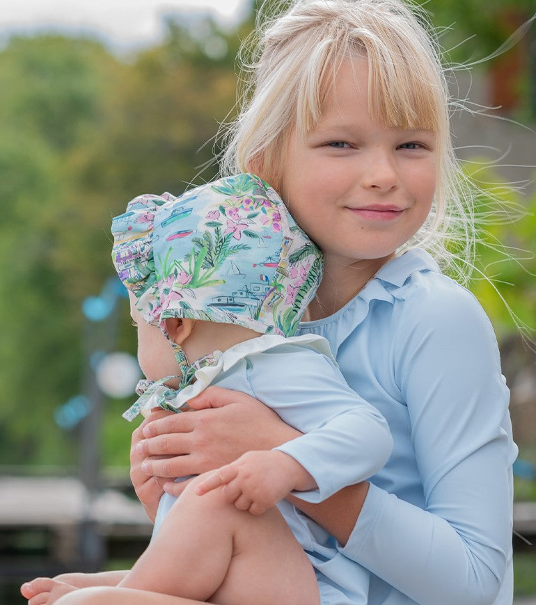 Sun protective hat for baby girl in Liberty vista by Canopea