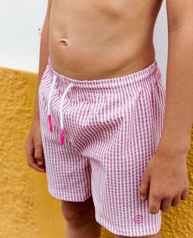 Fuschia seersucker swim shorts for boys by Canopea