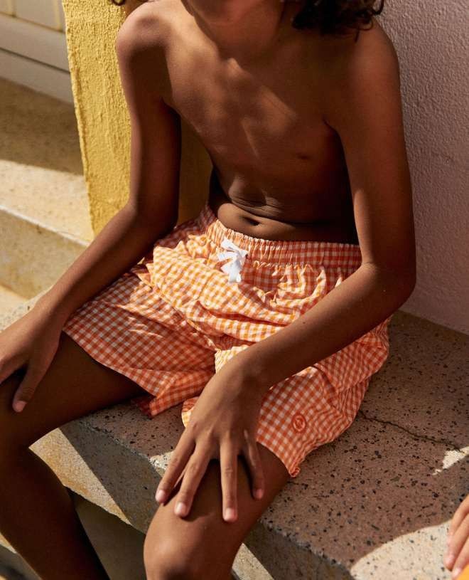 Swim shorts for boys in Gingham tangerine by Canopea