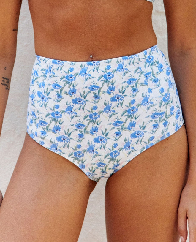 Sun protective bikini bottom for women LEANDRA in springtime floral print by Canopea